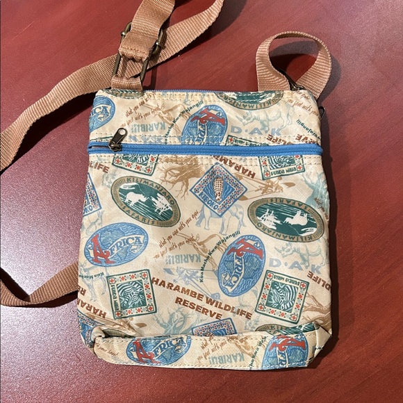 Disney's Animal Kingdom Harambe Safari Crossbody - Picture 2 of 3